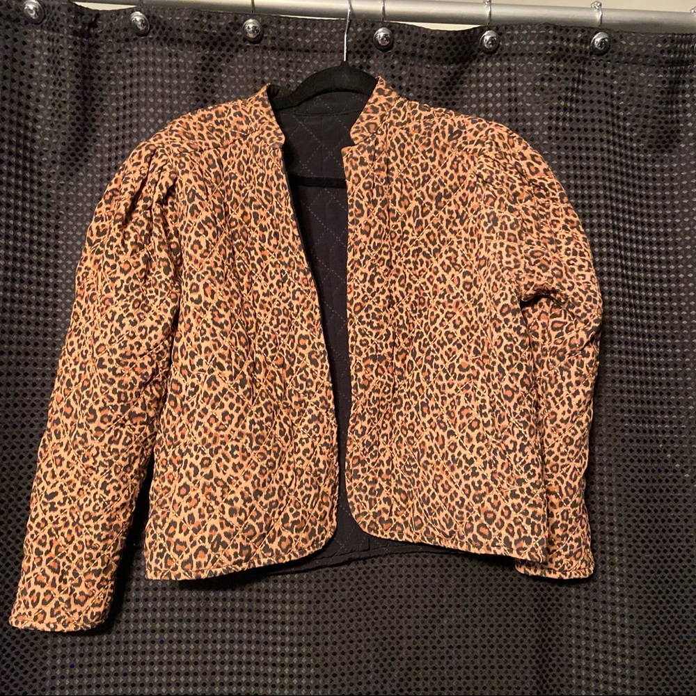 Reversible Cheetah print and black quilted jacket